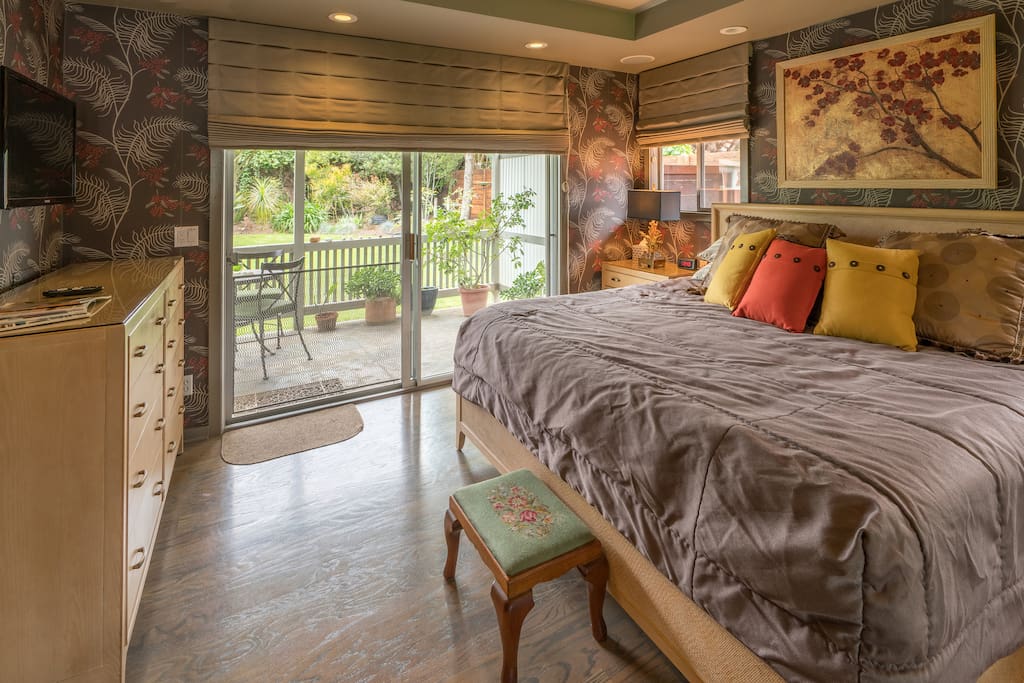 Luxurious king bed and beautifully appointed master bedroom with its own private, covered patio.