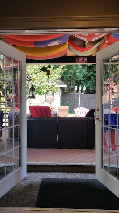 Walk out to a sunny patio overlooking the garden
