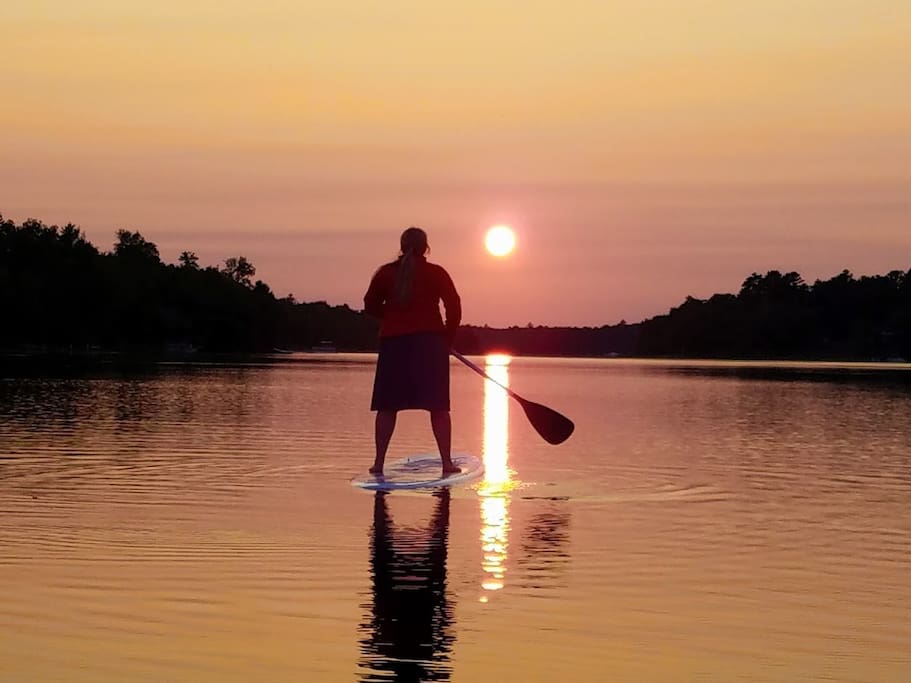 Paddling into the sunset at the Lodge on Sebec Lake