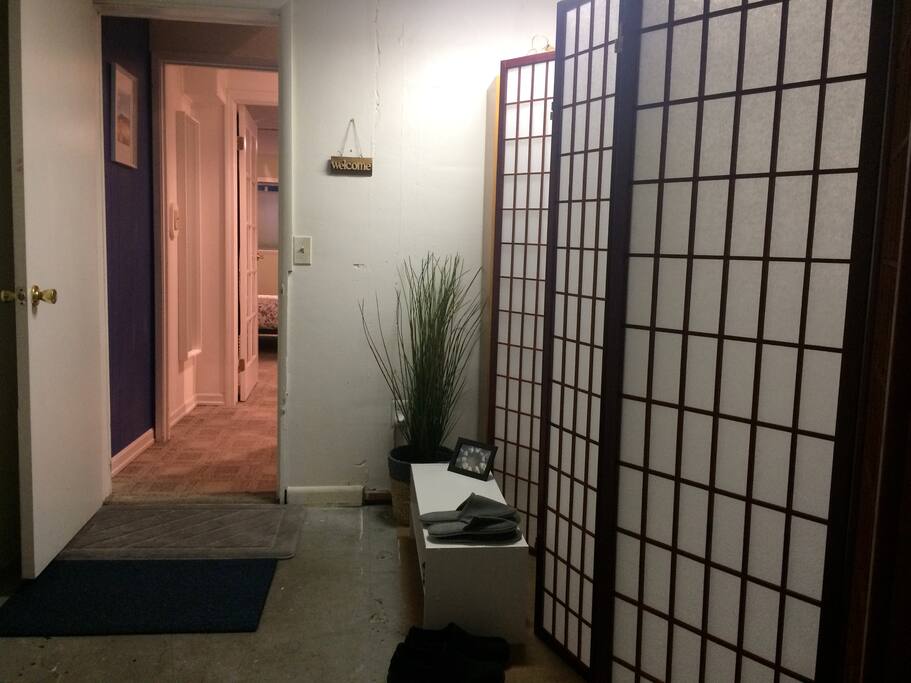 Friendly foyer with comfy slippers; room for bikes (2)