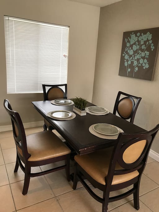 Dining room area next to the kitchen and living room