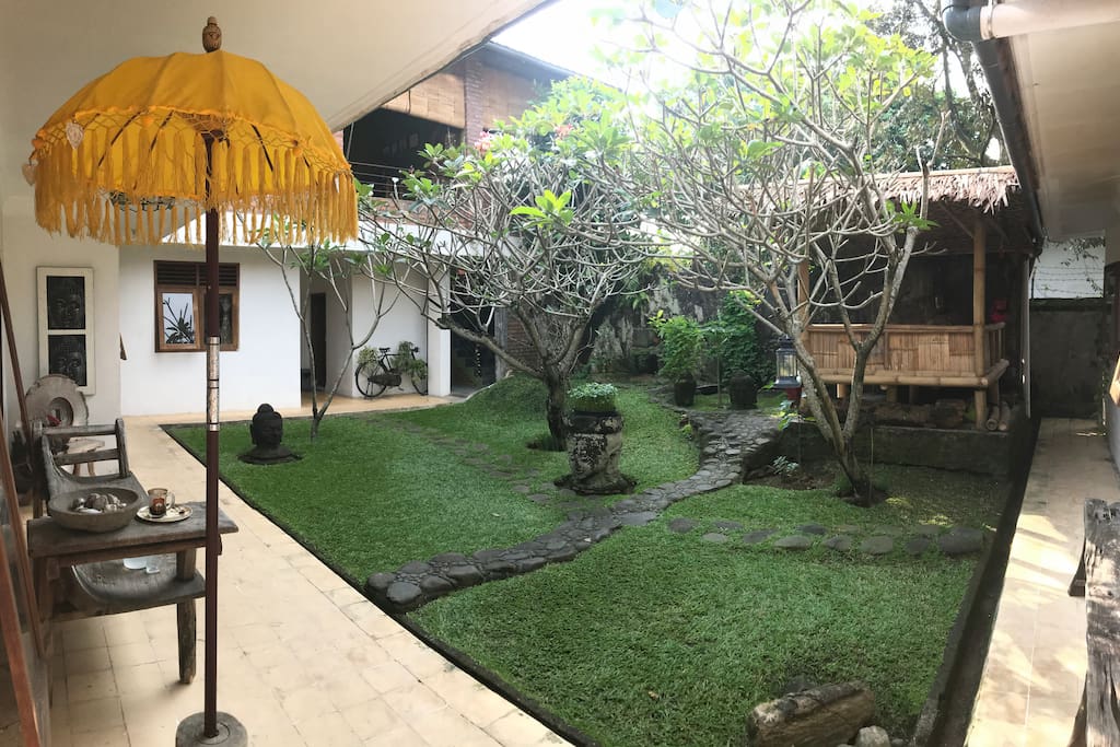 Private enclosed garden with Bali styled gazebo and candle lights.