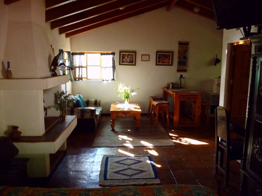 Open-floor studio space, dining / lounge area.