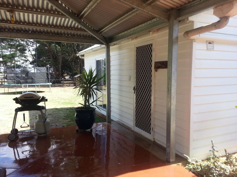 BBQ on the Verandah and the trampoline in the back ground