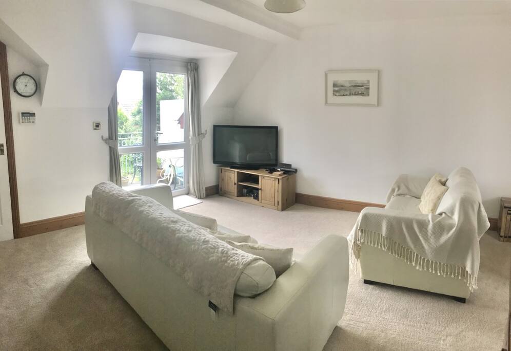 Sitting Room with French Doors onto Balcony.