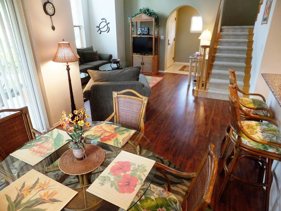 View of the dining room, living room and staircase