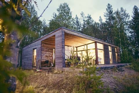 Modern river house, midnight sun, northern light!