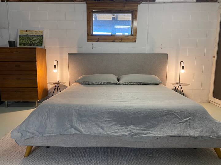 King bed from Casper. Really comfortable. Bedroom is setup in the unfinished ground level where it’s cool and perfect for sleeping to the sound of the waves. 