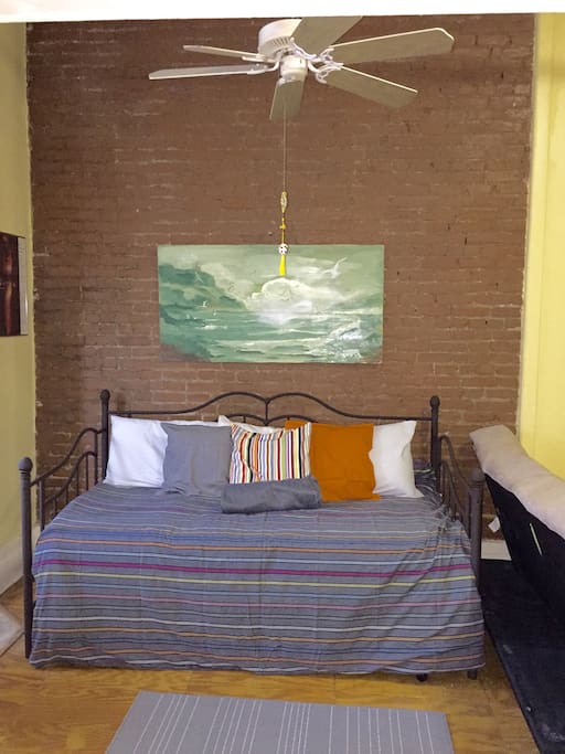 Trundle bed offers additional bedding for two (twin under bed).