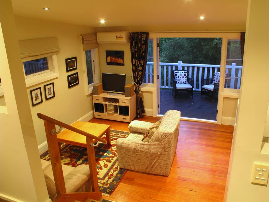 Lounge with French doors to private balcony