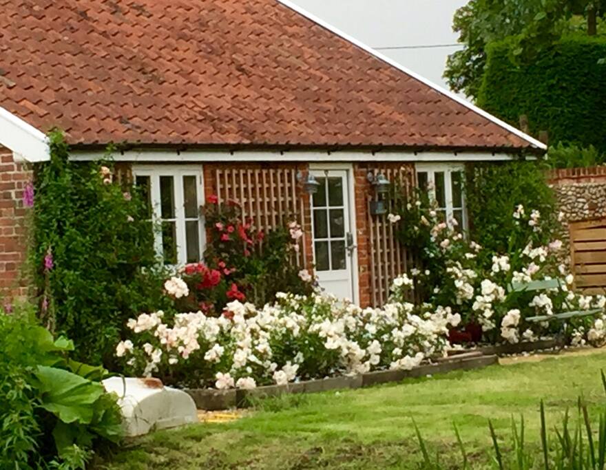 another shot of the rose garden and the Old Stables front door