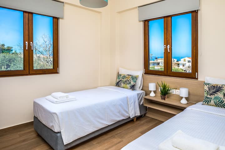 First Floor: Bedroom 4 with two single beds (or king bed)  and ensuite bathroom