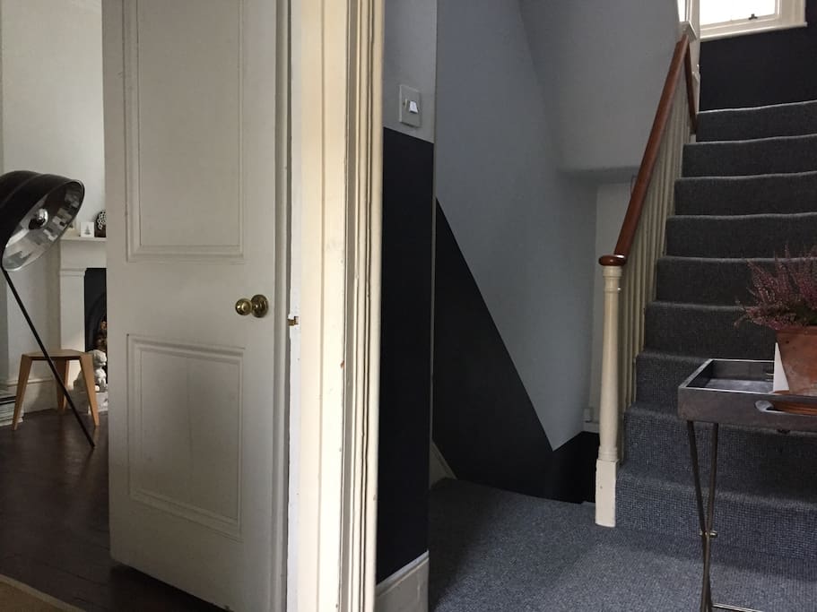 When you arrive: hallway stairs lead down to kitchen and up to bedrooms