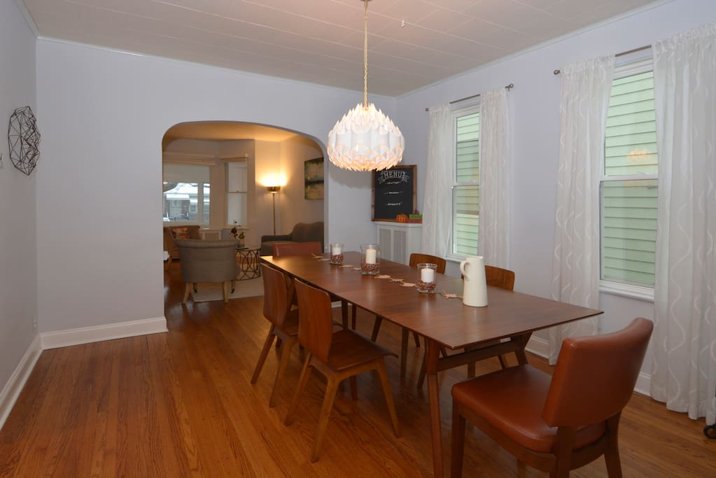 The semi-enclosed dining room is the warm and inviting heart of our home
