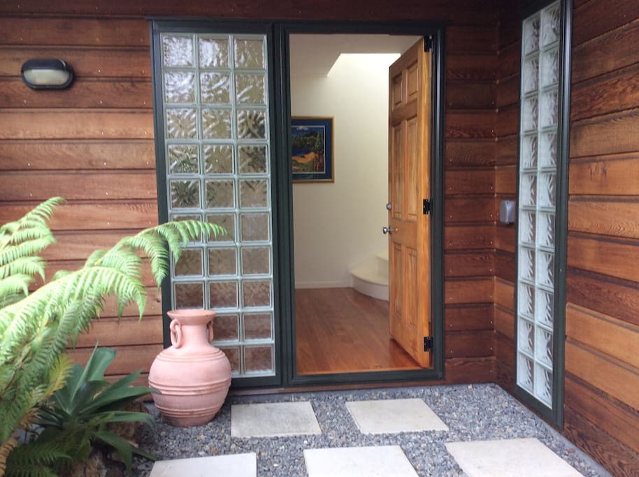 Welcome to our house. Enter through the front door.