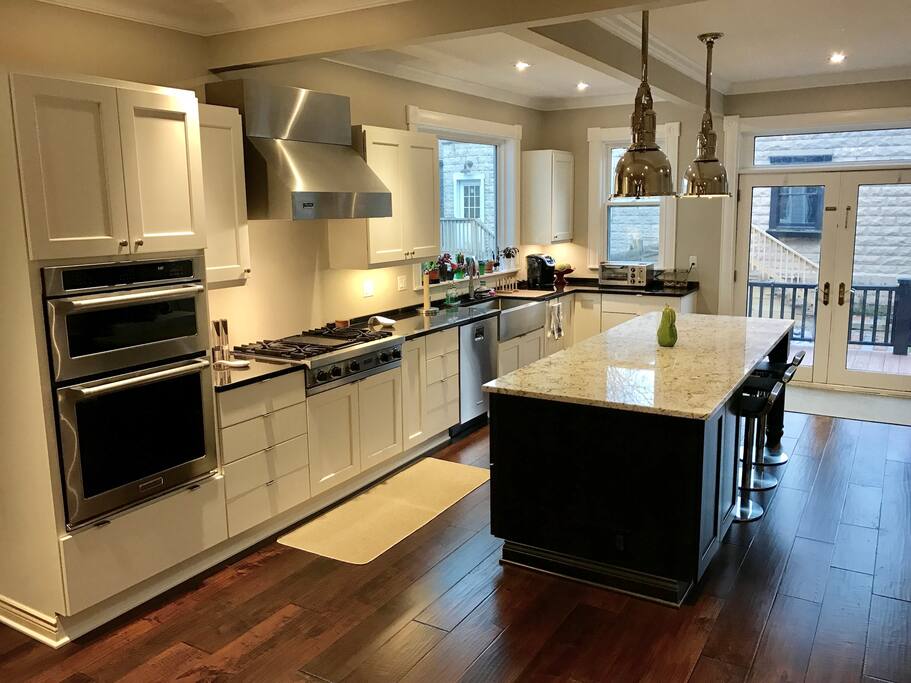Help yourself to our gourmet kitchen equipped with top of the line appliances (Viking, Kitchen Aid, etc.) Enjoy breakfast at our kitchen island.