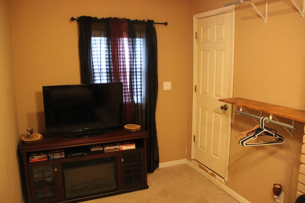Two different areas to hang clothes plus smartTV with dvd player.