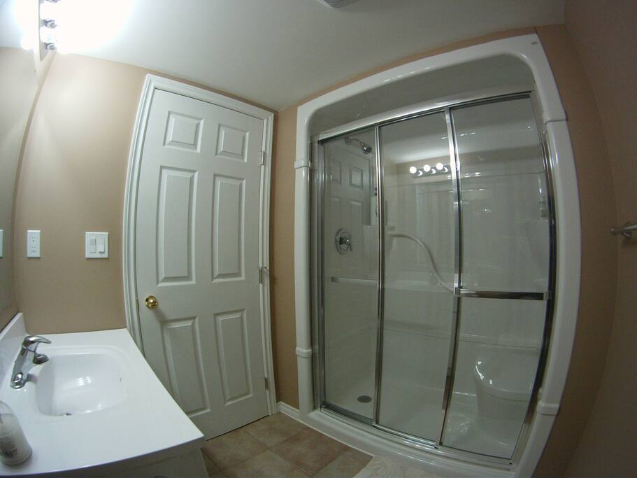 Shower with seat and hand rails