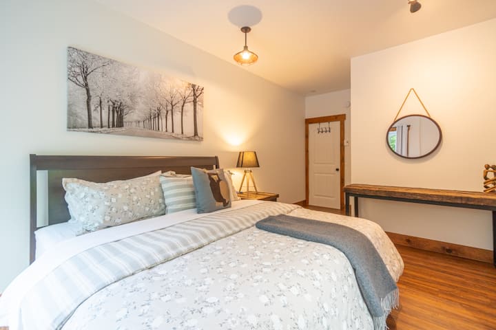 This is the second bedroom of the converted garage. Peaceful decor to promote a good night's sleep.