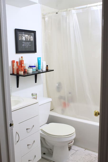 Main Bathroom, guests main bathroom, full shower with tub.