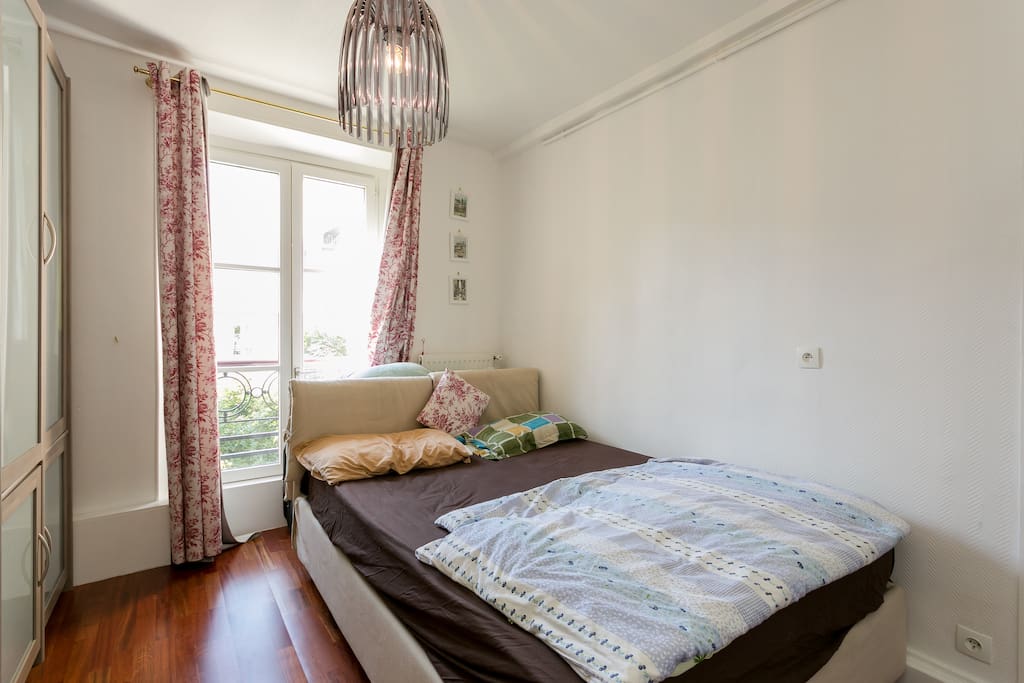 The cozy room with a huge french styled window