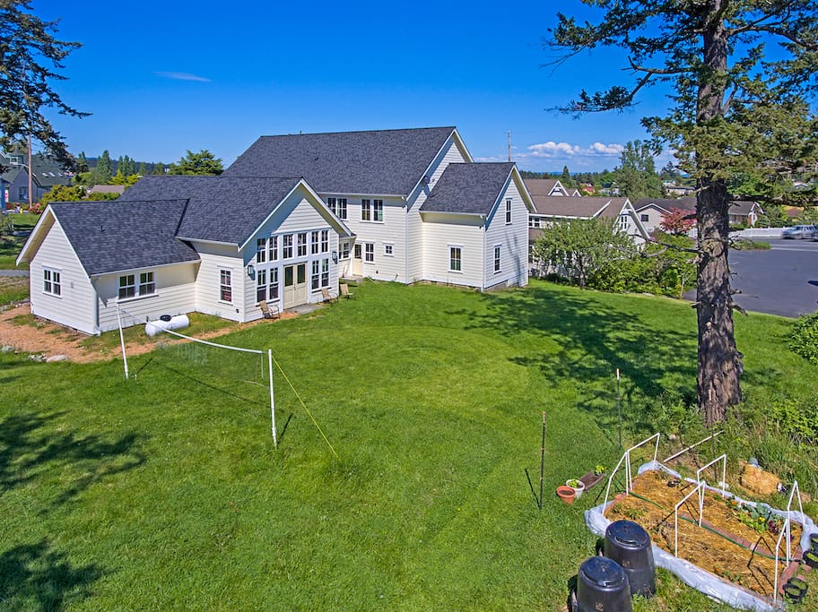 View of backyard with volleyball net
