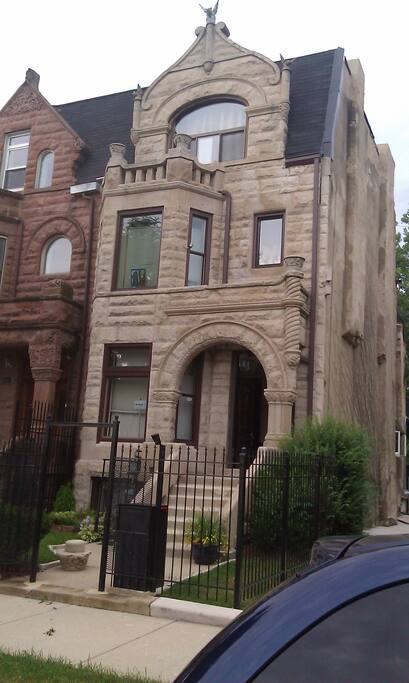 Features 3 Gargoyles at top. limestone and original door
