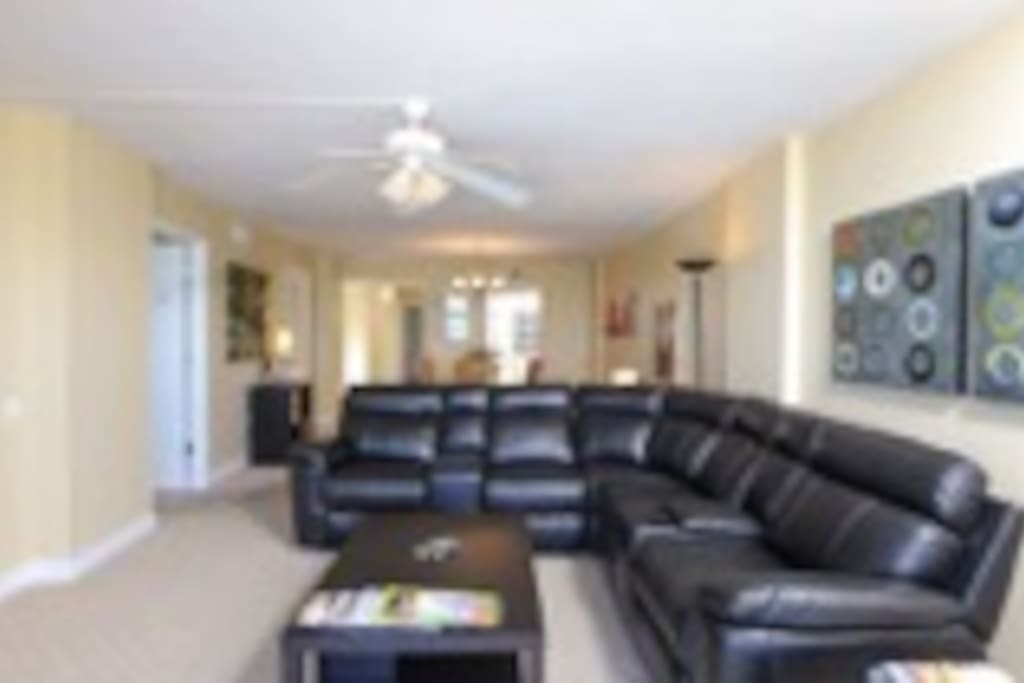 Livingroom and dining behind couch