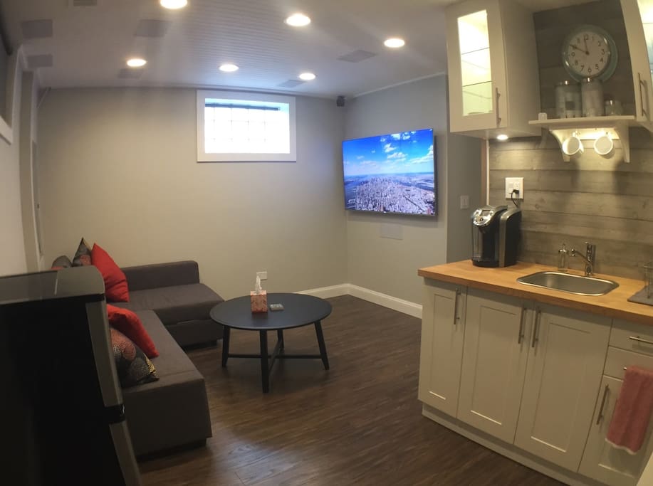 Suite living area with cable TV and kitchenette; Keurig and coffe/tea pods provided