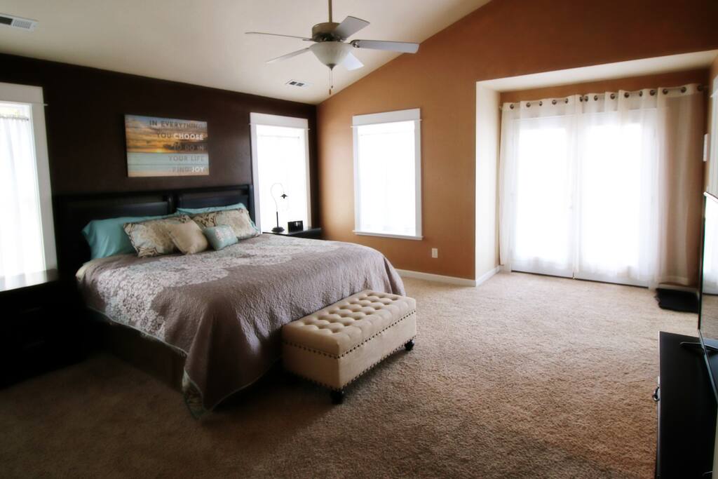 Master retreat with king bed, walk-in closet, sunk-in tub with separate shower and unbelievable mountain and vineyard views. Double doors exit to the 700sq ft deck and outdoor kitchen space which steps down to the pool and gazebo.