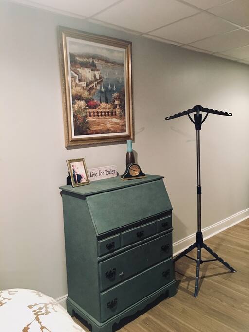 Drawer space available along with hanging valet station