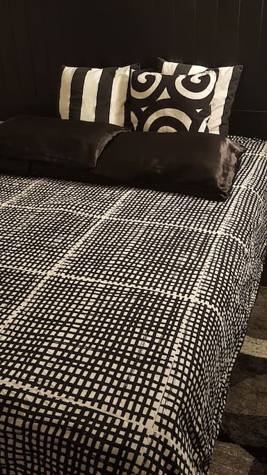 Large luxurious master bedroom with huge King size bed