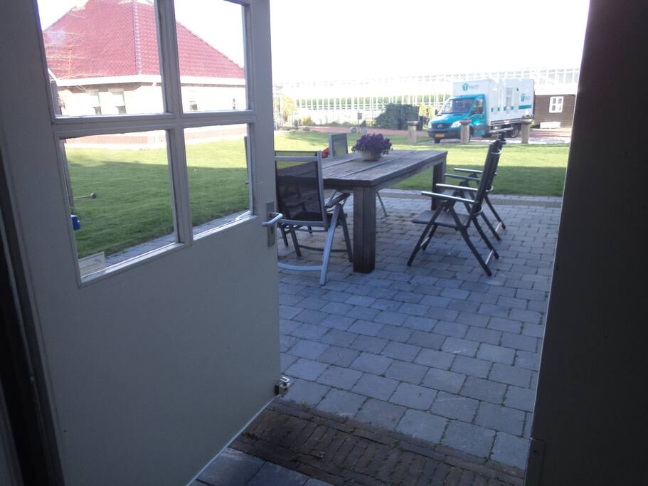 Terrace with big table 4 seats, BBQ and garden.