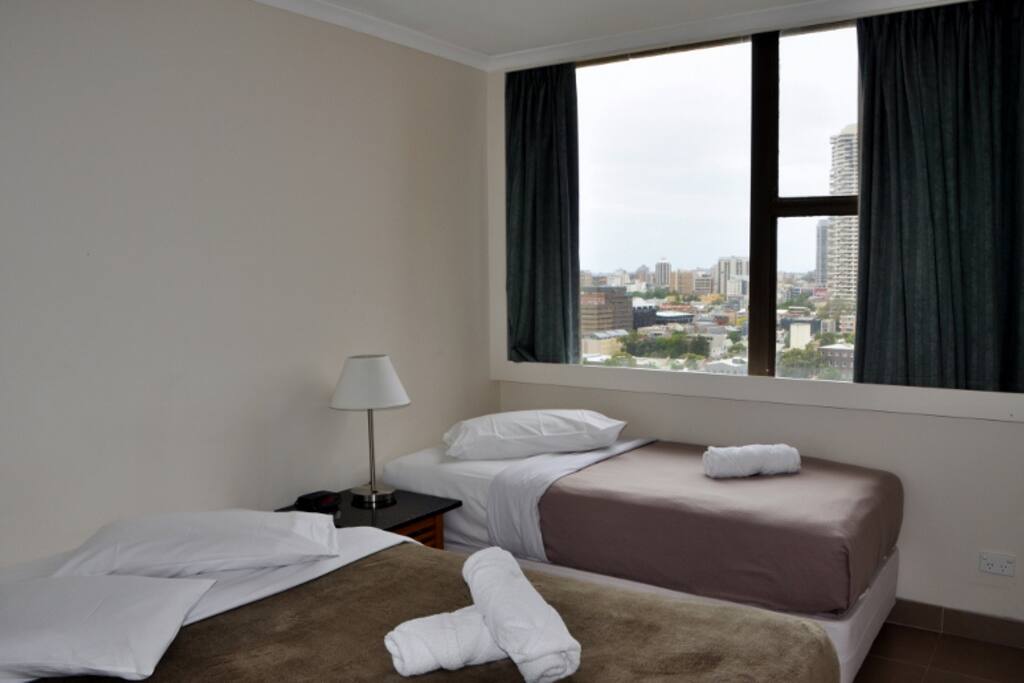 Bedroom contains 1 queen and 1 single beds