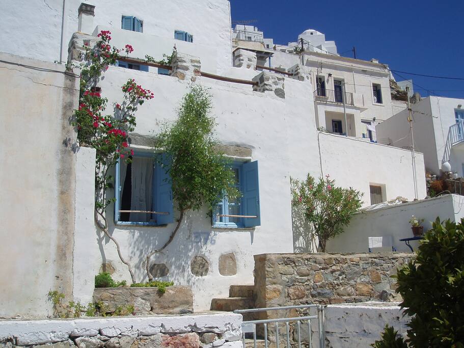 The entrance of the house and the groundfloor terrace