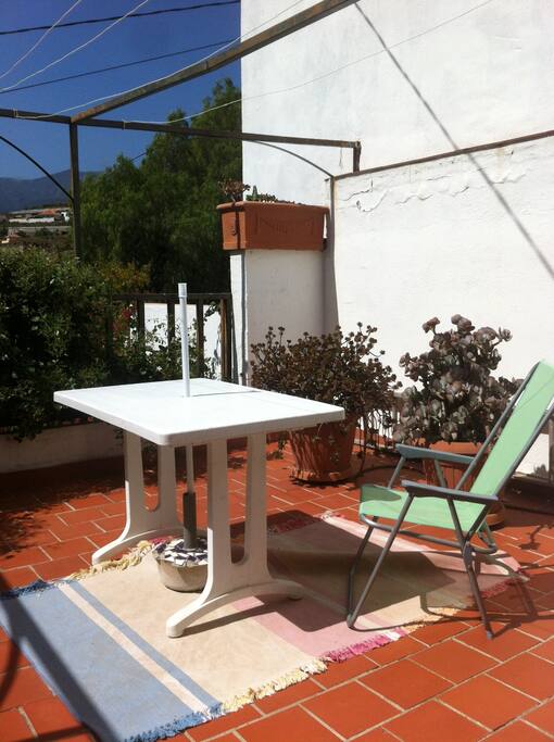 terraza al lado de la habitación