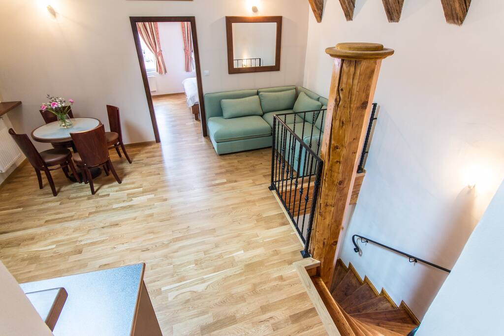 Looking down from stairs to second bedroom