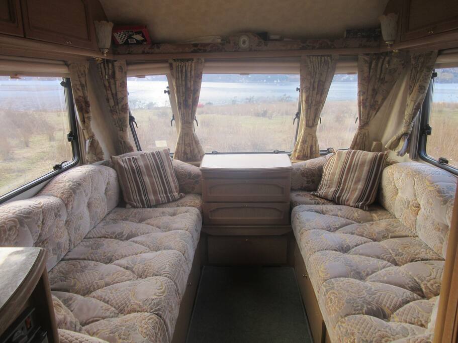 Main seating area folds down to double bed.