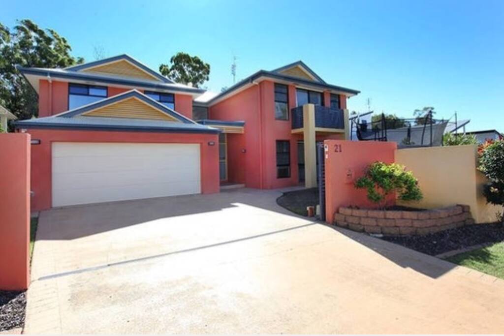 front of house with security electric gate.