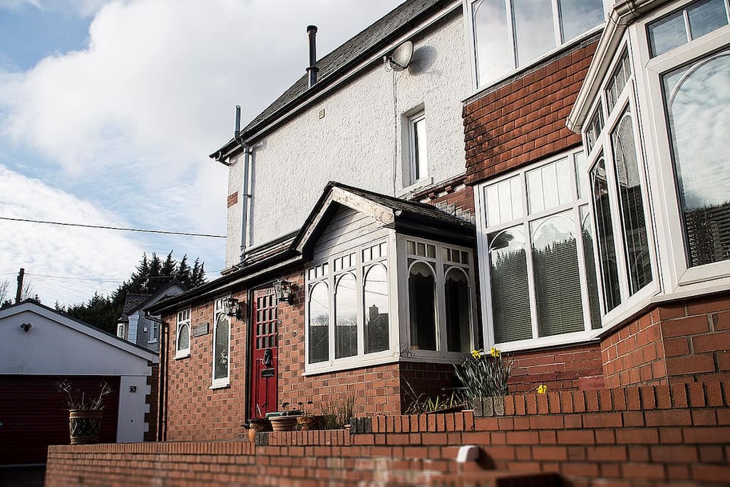 Double garage and plenty of parking space in front.