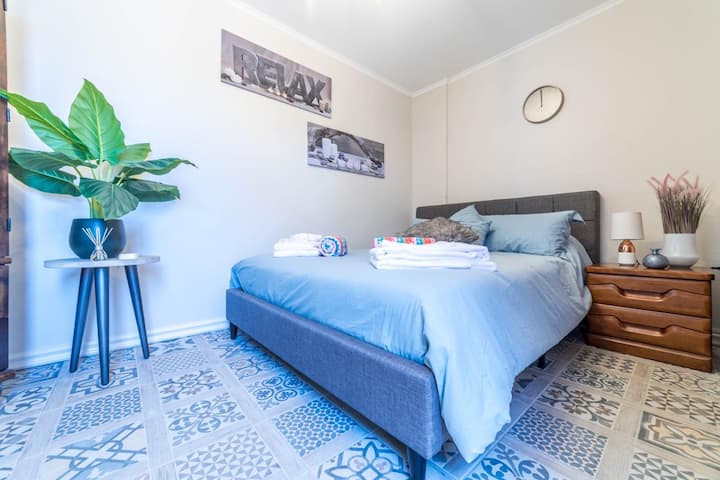 Queen bedroom- separate from the main house- adjacent to the pool- has its own full bathroom and A/C unit