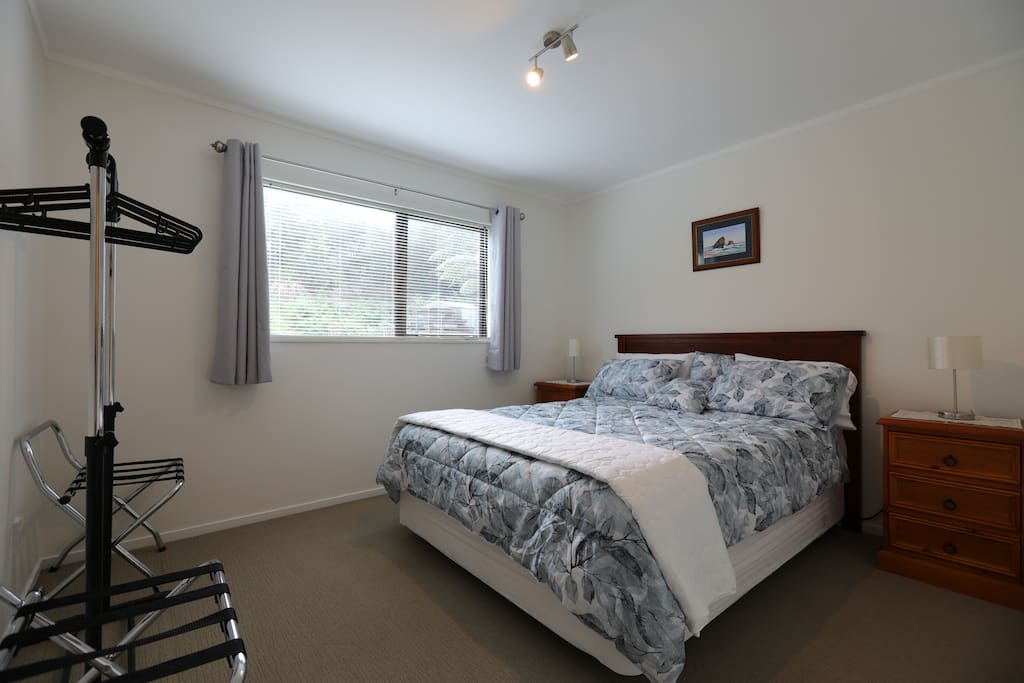 Queen size bed in main bedroom