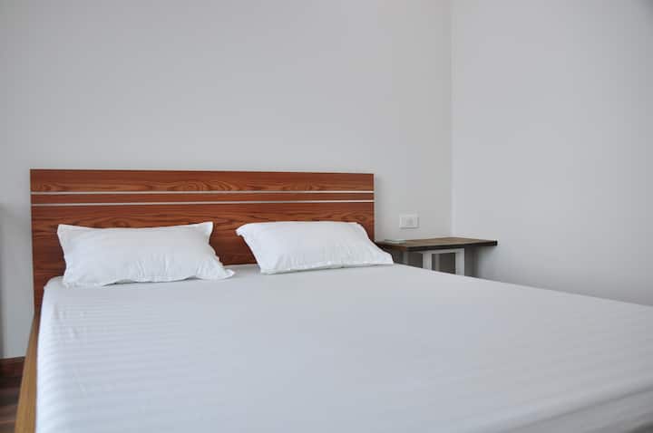 Queen-size, spring mattress bed 

