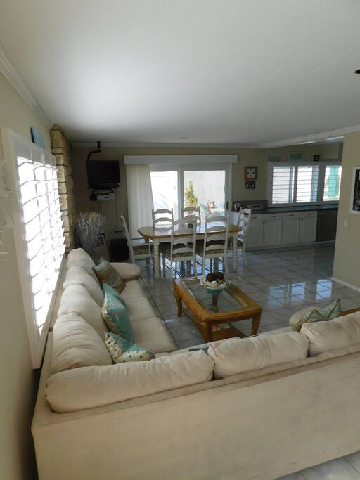 Open floor family room, dining room and kitchen.