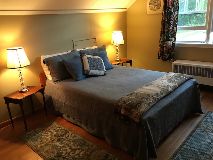 Queen Bed at top of the stairs ready to help you unwind and relax