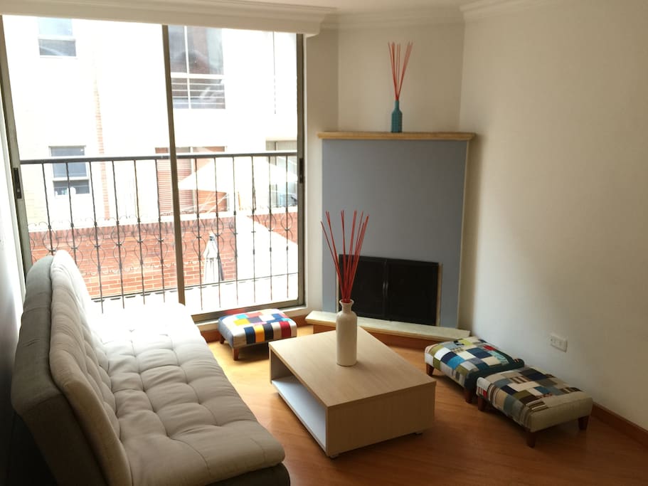 Living room with sofa & fire place