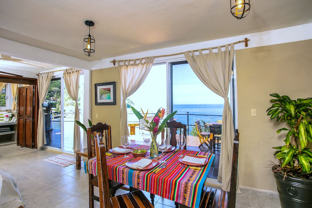 Double sets of sliding glass doors to the patio outside let in lots of light.