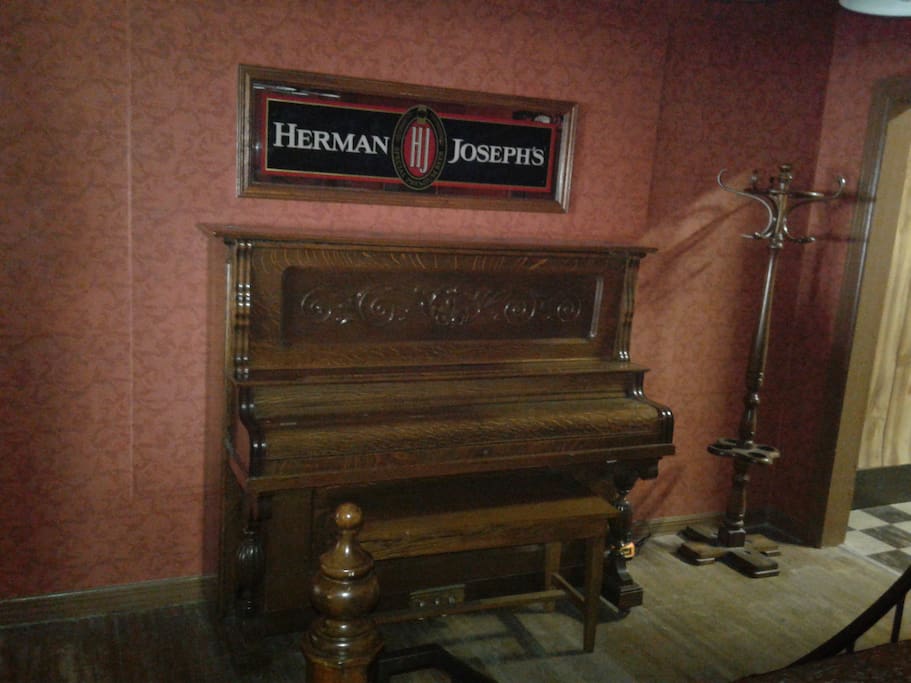 Store your valuables in the hidden compartments in this 100 year old prohibition piano.