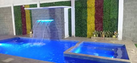 House with a pool and beach access