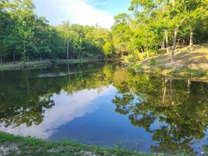 Crooked Creek Cabin. Private Setting on a Pond . Cabins for Rent in